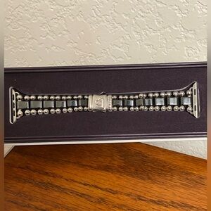 Lagos Smart Caviar watch band in black ceramic and stainless steel.